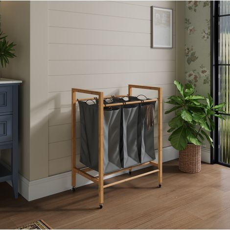 Cesto para ropa de 3 compartimentos con ruedas 90 L de bambú y tela, carbón/natural DESVIAE (1/5)