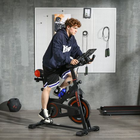 Vélo d’appartement 8 kg noir rouge avec une résistance réglable, volant d’inertie, écran LCD, guidon et siège réglables, et
