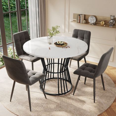 Table à manger blanche avec structure métallique noire, plateau effet marbre, design moderne pour cuisine. (1/5)