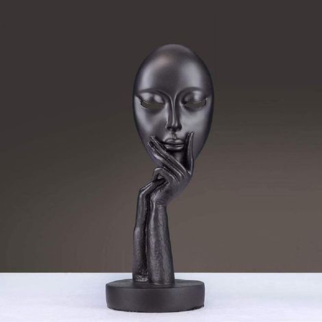 Statues et sculptures en résine noire représentant des personnages dont le silence est d'or (1/5)