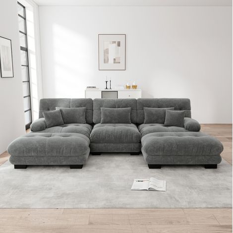 Canapé d'angle modulaire gris en chenille avec ottomans amovibles et assise profonde (1/5)