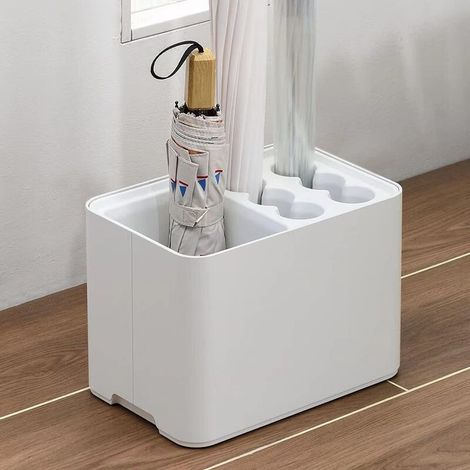 Porte-parapluies blanc avec bac de récupération, idéal pour une entrée, un coin peu encombrant, la maison ou le bureau. Peut contenir 10 parapluies.