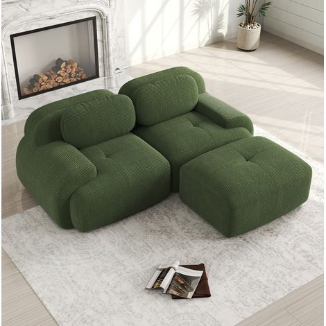 Modulares Ecksofa grün aus Cordstoff rahmenlos mit geschwungenen Armlehnen (1/5)