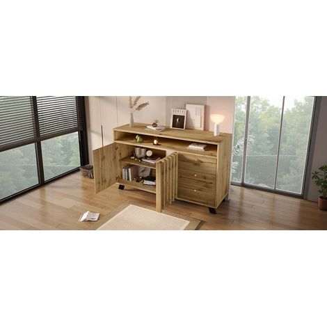 Commode avec 3 tiroirs et 2 portes. Meuble de rangement doté d’un espace ouvert et d’une structure en lamelles, dans un style vintage.  Dimensions : 120B x 40T x 85H cm.