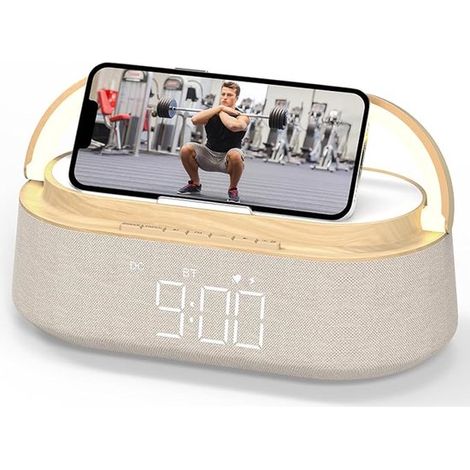 Radio reloj digital con carga inalámbrica, radio FM, luz nocturna y Bluetooth.