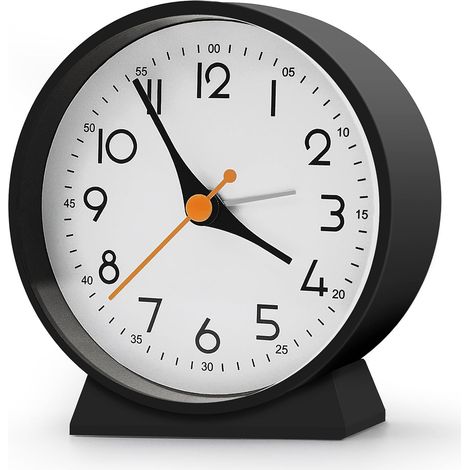 Este despertador analógico es silencioso y compacto, lo que lo hace ideal para decorar tu sala de estar, dormitorio o mesita de noche. (1/4)