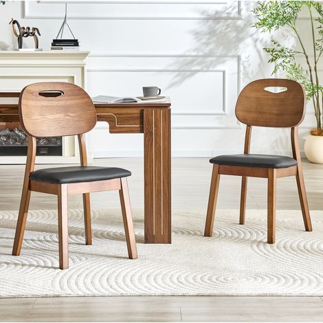Lote de 2 sillas de comedor de madera de hevea e imitación cuero, con respaldo ovalado y asa, negro (1/4)