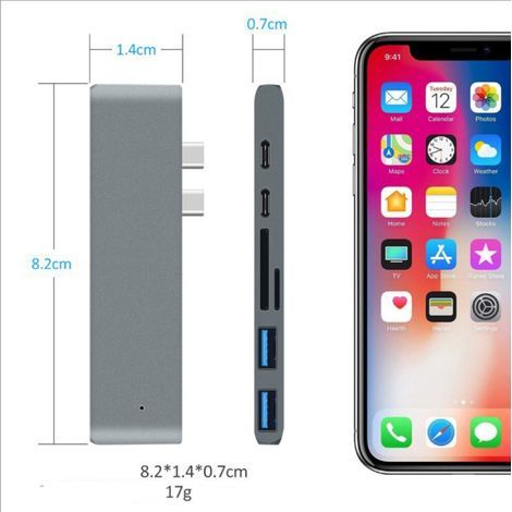 Révolutionnez votre poste de travail grâce à notre adaptateur multiport, équipé d'un lecteur de cartes SD/TF et d'un port USB 3.0, idéal pour les créatifs et les professionnels nomades. (1/4)