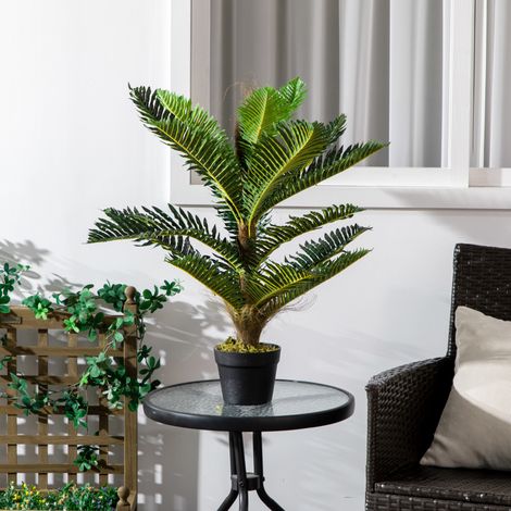 Palma artificiale, alta 85 cm, con 18 foglie grandi e realistiche e vaso incluso.