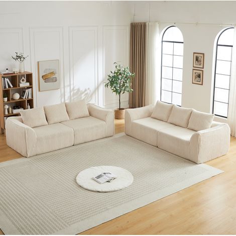 Canapé modulaire en velours côtelé beige avec dossier et accoudoirs courbes, assise extra-large en mousse, sans montage, facile à déplacer – de FLORAGRACE (1/5)