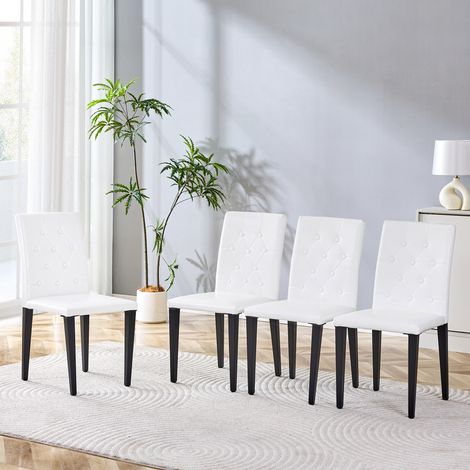 Ensemble de 4 chaises de salle à manger noires et blanches – élégance raffinée. Parfait pour les espaces repas européens, pieds métalliques noirs, agencement polyvalent. (1/5)