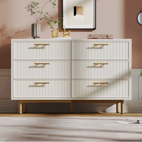 Cómoda 120x40x75 cm blanca en tablero de partículas con 6 cajones, frentes acanalados y patas metálicas doradas (1/5)