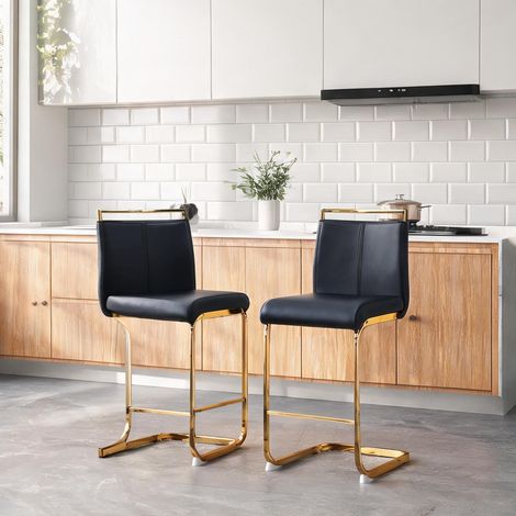 Tabourets de bar scandinaves en simili cuir noir et métal doré (1/5)