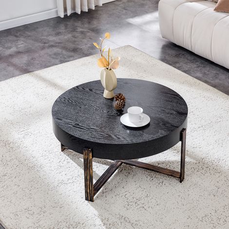 Table basse ronde diamètre 68 cm, style industriel rétro. Plateau MDF imitation bois noir, pieds croisés métal bronze vieilli, parfait déco Wabi-Sabi.