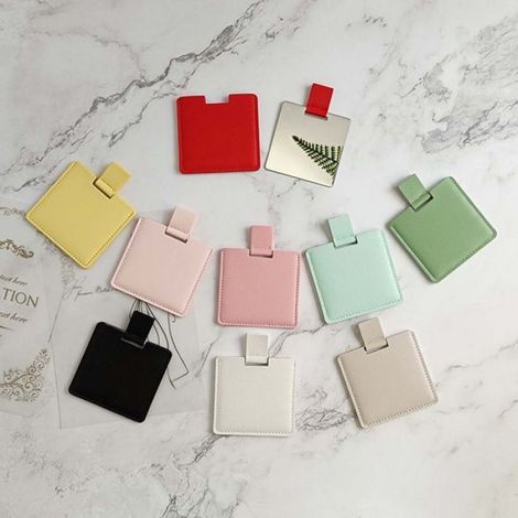 Miroir de beauté portable en acier inoxydable avec étui en PU - Compact et idéal comme cadeau Le noir (1/3)