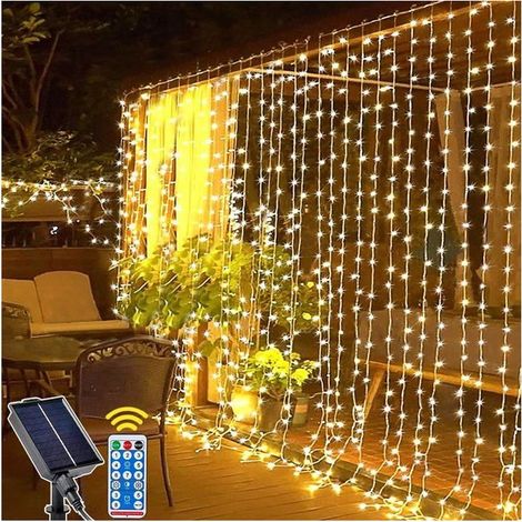 Rideau Lumineux Solaire Extérieur, 3m x 3m 300LED Lumineuse Solaire avec Télécommande, 8 Modes Cascade Solaire(Blanc Chaud) (1/5)