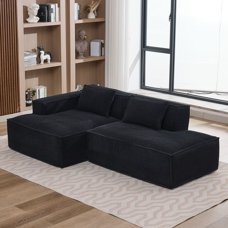 Divano angolare in poliestere nero con seduta a molle insacchettate e 2 cuscini, 233x129x70 cm (1/5)
