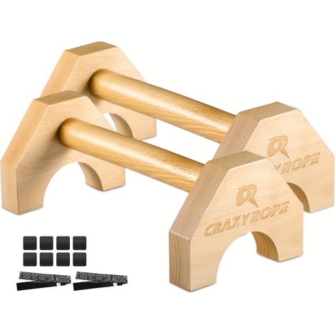 Une paire de supports à pompes en bois, adaptés aux planches d'entraînement en salle de sport. (1/5)
