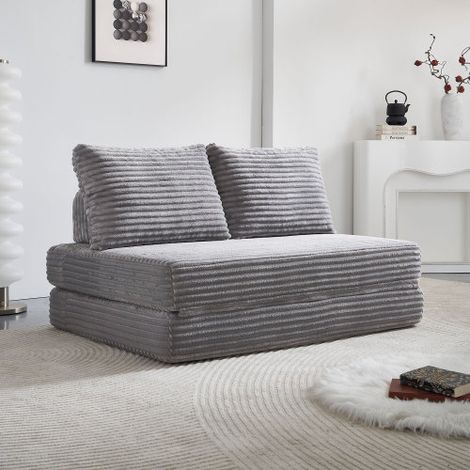 Este sofá cama sin estructura no requiere montaje y está fabricado en tela satinada es ideal para el salón, el estudio y el dormitorio. El color es gris claro. (1/5)
