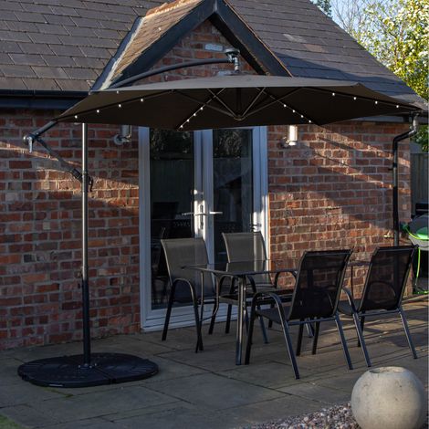 Outdoor 4 Person Rectangular Glass Top Garden Dining Table Chairs With Black Banana Lit Parasol and Base (1/5)