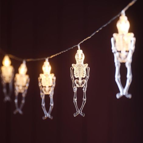 Halloween-Girlande mit 10 durchsichtigen Kunststoffskeletten – warmweißes LED-Licht – batteriebetrieben mit 6-Stunden-Timer – bewegliche Gelenke (1/5)