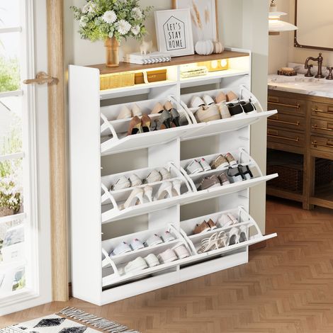 Scarpiera moderna con 6 scomparti a ribalta, illuminazione a LED, due vani a giorno, adatta per ingresso o corridoio, finitura bianca e naturale. Dimensioni: L120/H130/P24 cm