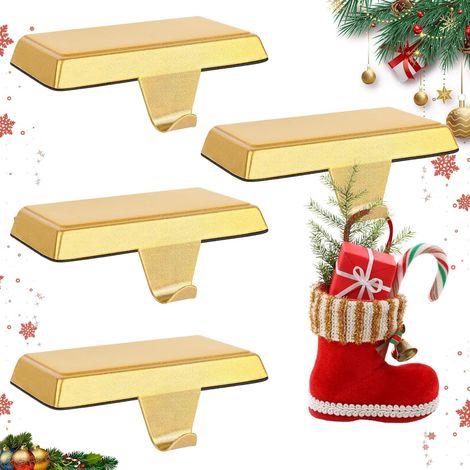 Juego de 4 soportes antideslizantes de metal dorado para calcetines navideños, ideales para chimenea, repisa, ventana o decoración navideña.