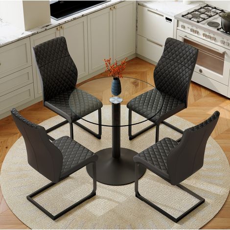 Conjunto mesa redonda 85 cm de vidrio templado y 4 sillas negras de PU (1/5)