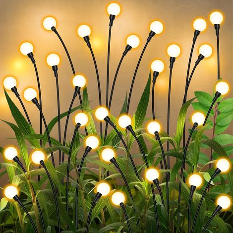 Une lampe solaire à effet luciole, idéale pour éclairer votre jardin et votre pelouse. Blanc chaud. (1/5)