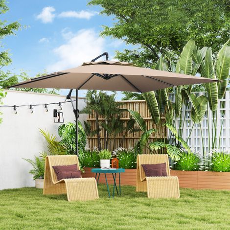 Parasol déporté 3 x 3 m avec toile réglable et base en croix. Fabriqué en métal et polyester. Couleur kaki.