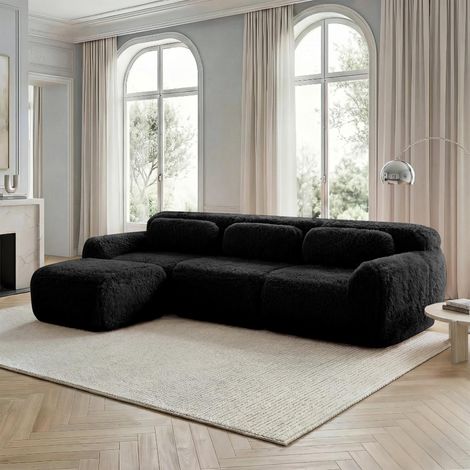 Ce canapé d'angle modulable est revêtu d'un tissu doux, possède une structure sans cadre et est livré entièrement monté. Il est fourni avec des coussins, (1/5)