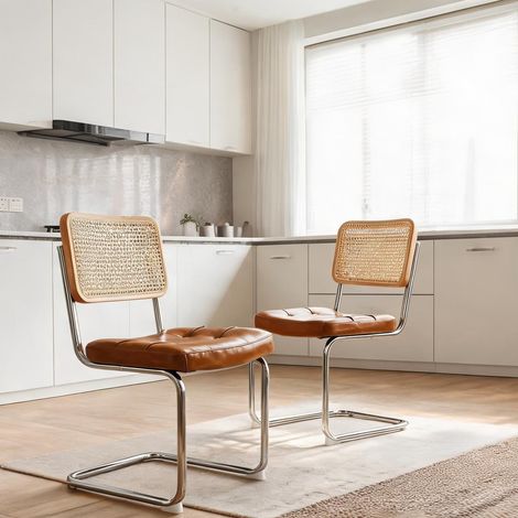 Chaises de salle à manger en simili cuir marron et métal chromé (1/5)
