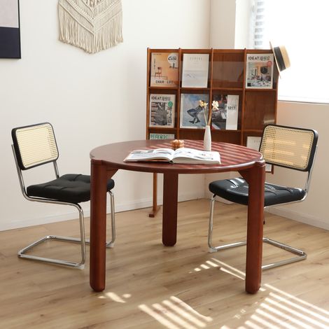 Silla de comedor de acero cromado negro, apilable, con respaldo de ratán y asiento en polipiel (1/5)