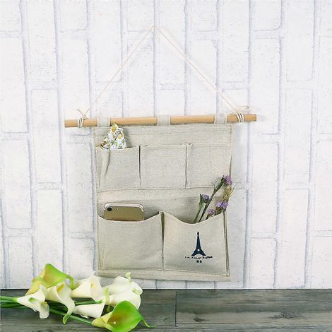 Pochette de rangement décorative en lin à 5 poches pour porte ou mur, idéale pour ranger vos petits objets. (1/4)