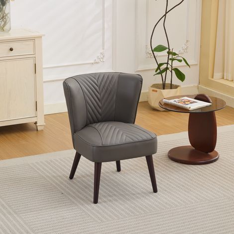 Poltrona lounge grigia in pelle e legno con trapuntatura diagonale e struttura robusta (1/5)