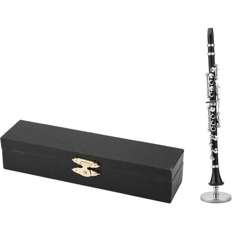 Clarinete miniatura decorativo de metal pulido: un elegante instrumento decorativo para una oficina o estudio, entregado en una caja refinada.