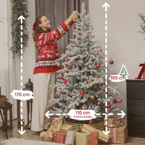 Un sapin de Noël enneigé de 180 cm de haut. Il est doté de branches réalistes et d'un socle métallique pliable. (1/5)