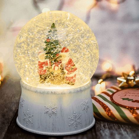 Sfera in vetro base bianco antico con albero, babbo e sacco regali ,led bianco caldo
