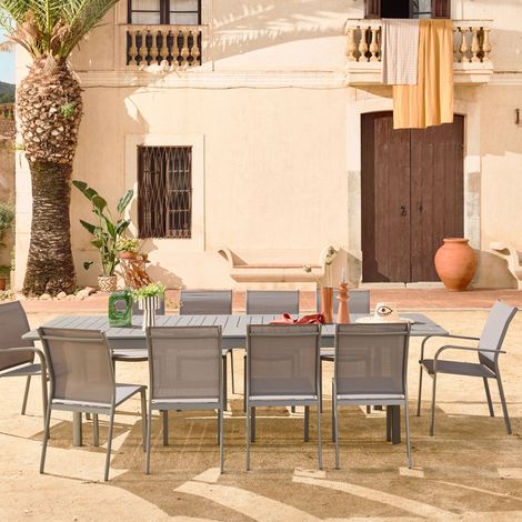 sweeek - Table de jardin extensible aluminium + 10 assises aluminium et textilène anthracite. 8 chaises. 2 fauteuils. 10 places. 290 x 100 x 75 cm (1/5)