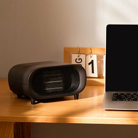 Chauffage d'appoint pour l'hiver, petit appareil de chauffage, chauffage électrique de bureau à chauffage rapide, fonction d'arrêt automatique en cas de basculement, norme nationale 220V, noir. (1/5)