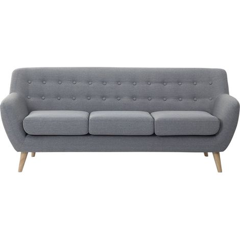 Sofá 3 plazas tapizado gris claro con respaldo copetudo patas de madera clara acolchadas gruesas sala de estar minimalista escandinava Motala
