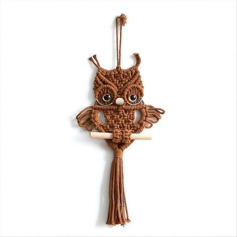Tapisserie murale tissée en macramé représentant un hibou, couleur caramel. (1/5)