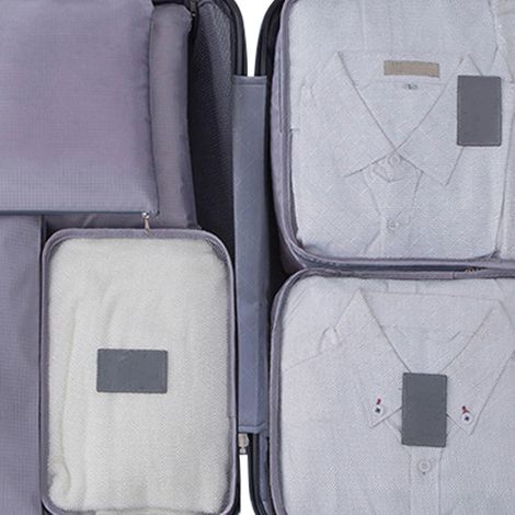 Lot de 7 cubes de rangement imperméables et résistants à la saleté en tissu Oxford, gris, pour vos bagages et vos voyages. (1/5)
