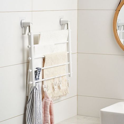 Porte-vêtements mural extensible et pliable à fixation sans perforation avec 4 clips anti-vent, modèle plastique 530mm pour balcon ou intérieur. (1/5)