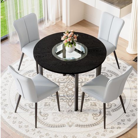 Set da pranzo con tavolo rotondo MDF e vetro nero 100 cm e 4 sedie in PU grigio chiaro con gambe in metallo nero (1/5)