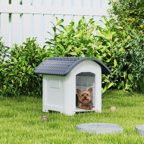 Caseta de exterior para perros, de plástico, con suelo elevado y desmontable, techo impermeable, color gris. (1/5)
