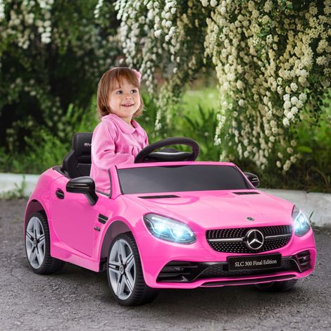Voiture électrique 12V 3-6 ans - PP/métal - 2 moteurs - suspension - télécommande - musique/klaxon/phares - permis - rose