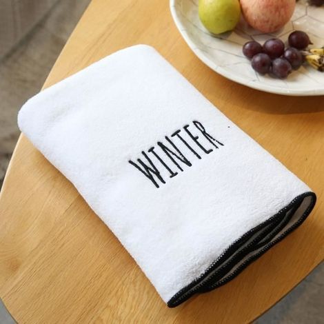The hotel offers quick-drying, absorbent microfiber towels in winter white for both men and women.