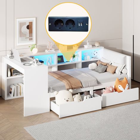 Lit blanc 90x200 cm avec tête rembourrée, étagères, tiroirs, station de recharge intégrée et lumières LED multicolores, plateforme en bois.