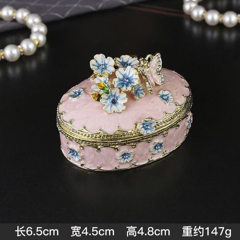 Boîte à bijoux ovale en émail rose à motif de fleurs de cerisier, avec couvercle rabattable, pour bagues et boucles d'oreilles. (1/2)